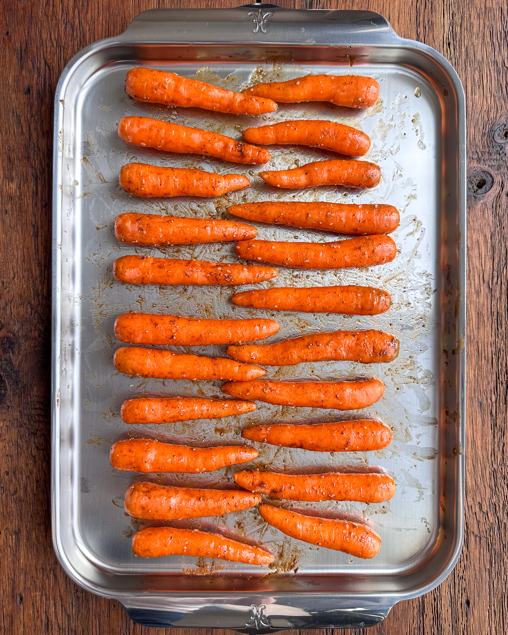 Spread the carrots out in a single layer on a parchment-lined rimmed baking sheet.