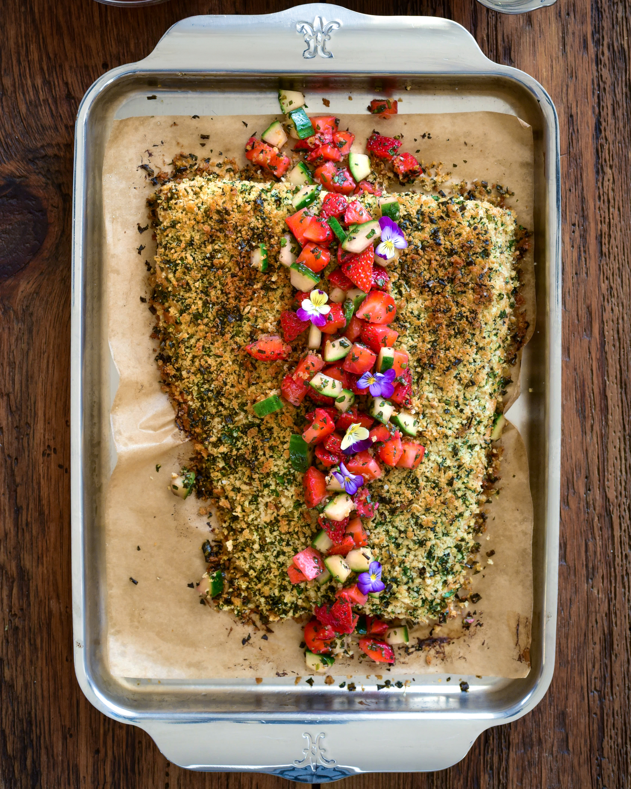 An Herb Crusted Salmon with Strawberry Mint Salsa on a sheet pan.