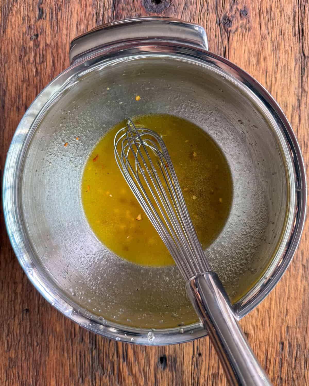 A bowl of honey lemon dressing.