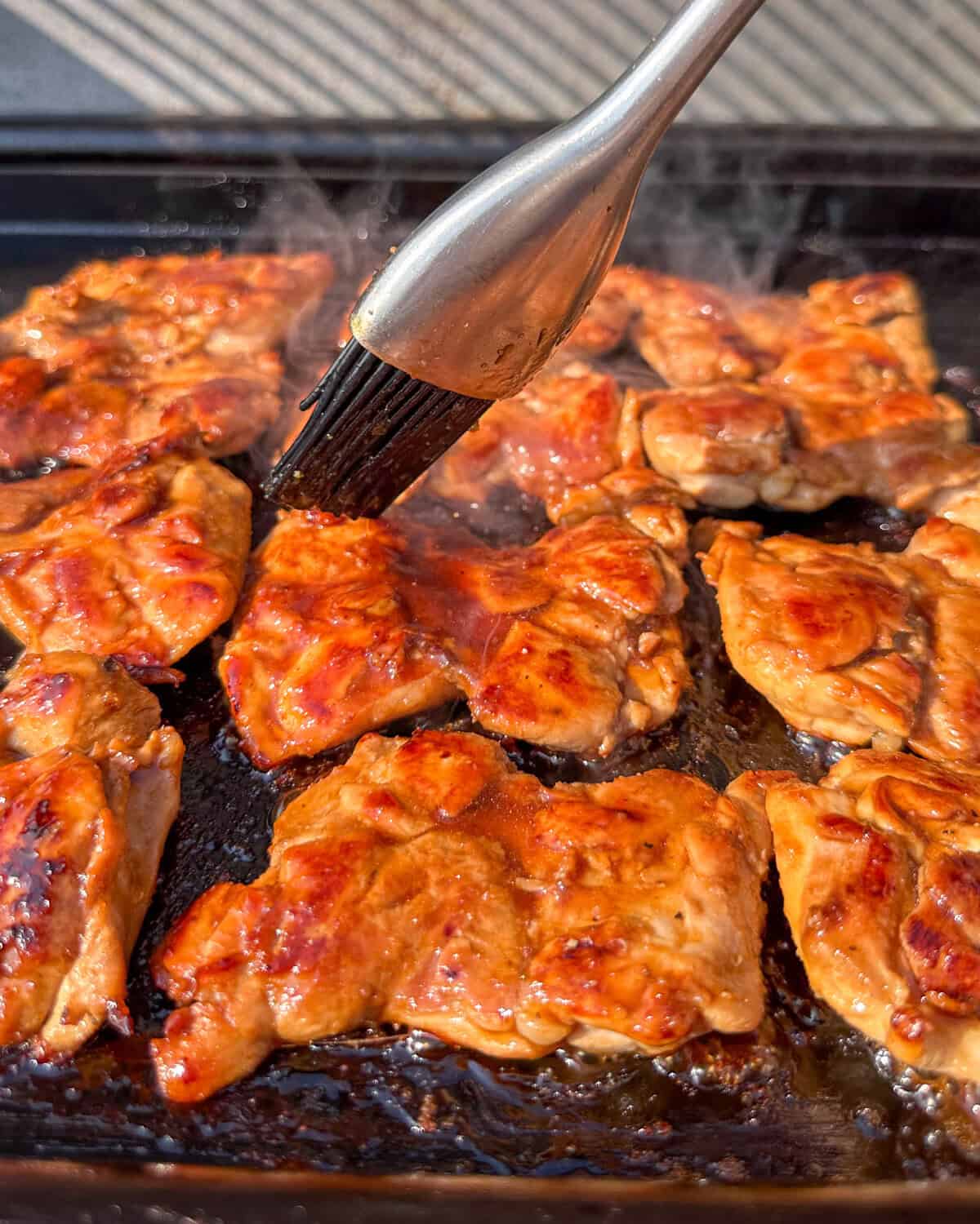 Brush the chicken with the reserved marinade to create a sticky glaze.