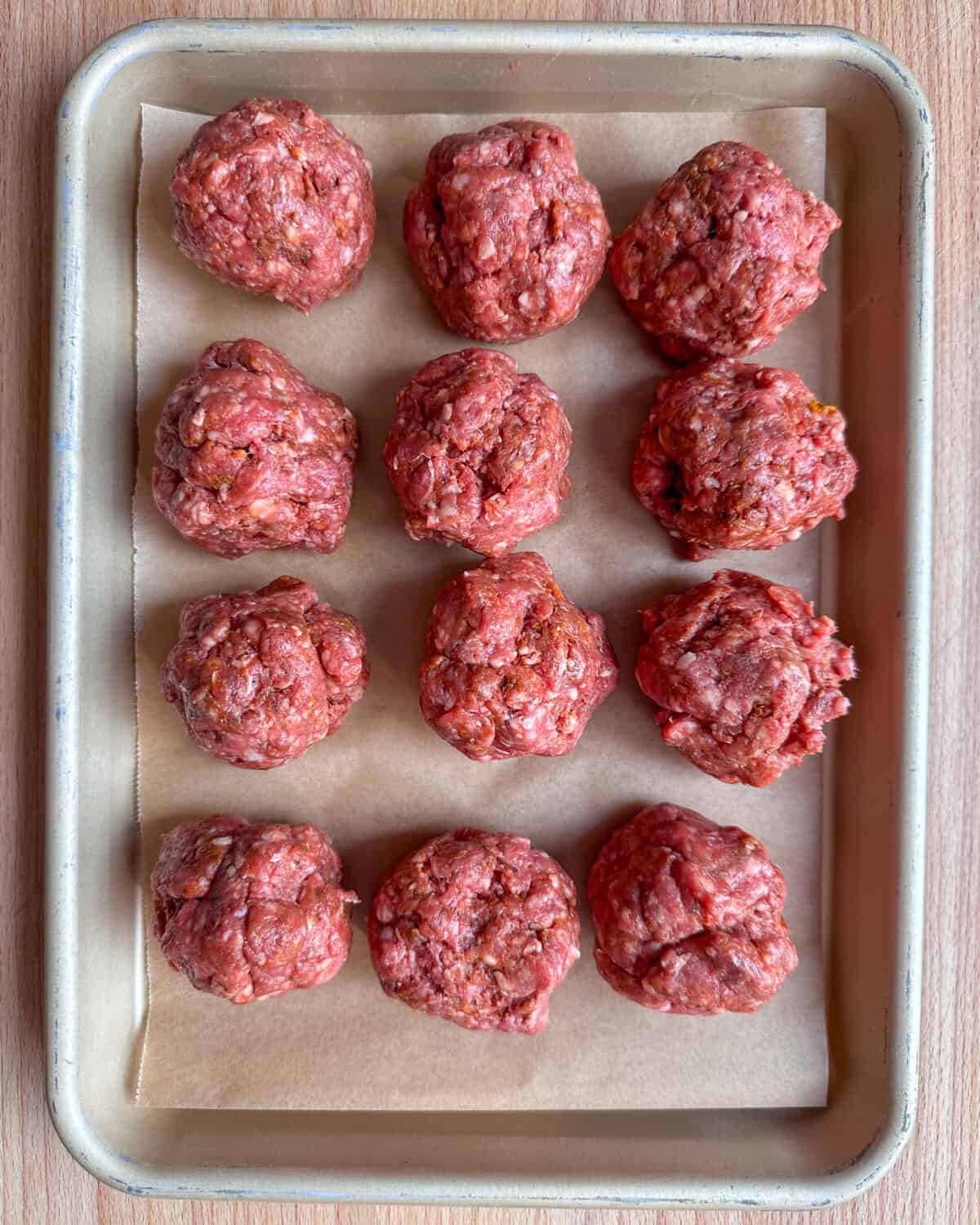Twelve lamb balls for smashed for sliders.