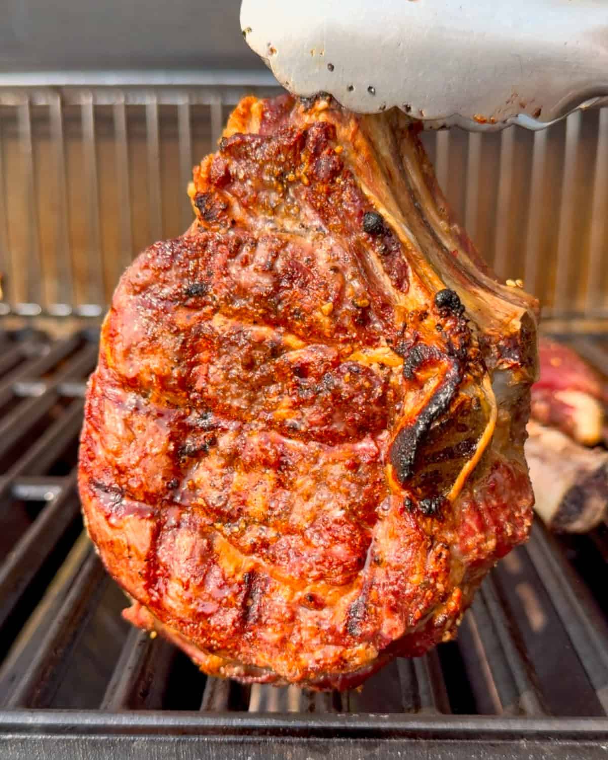 A grilled veal chop with grill marks.