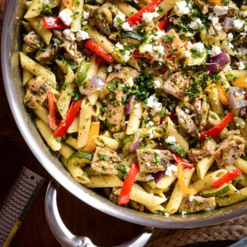 Zhoug Chicken Pasta Salad with Roasted Vegetables in a pot with a handle.