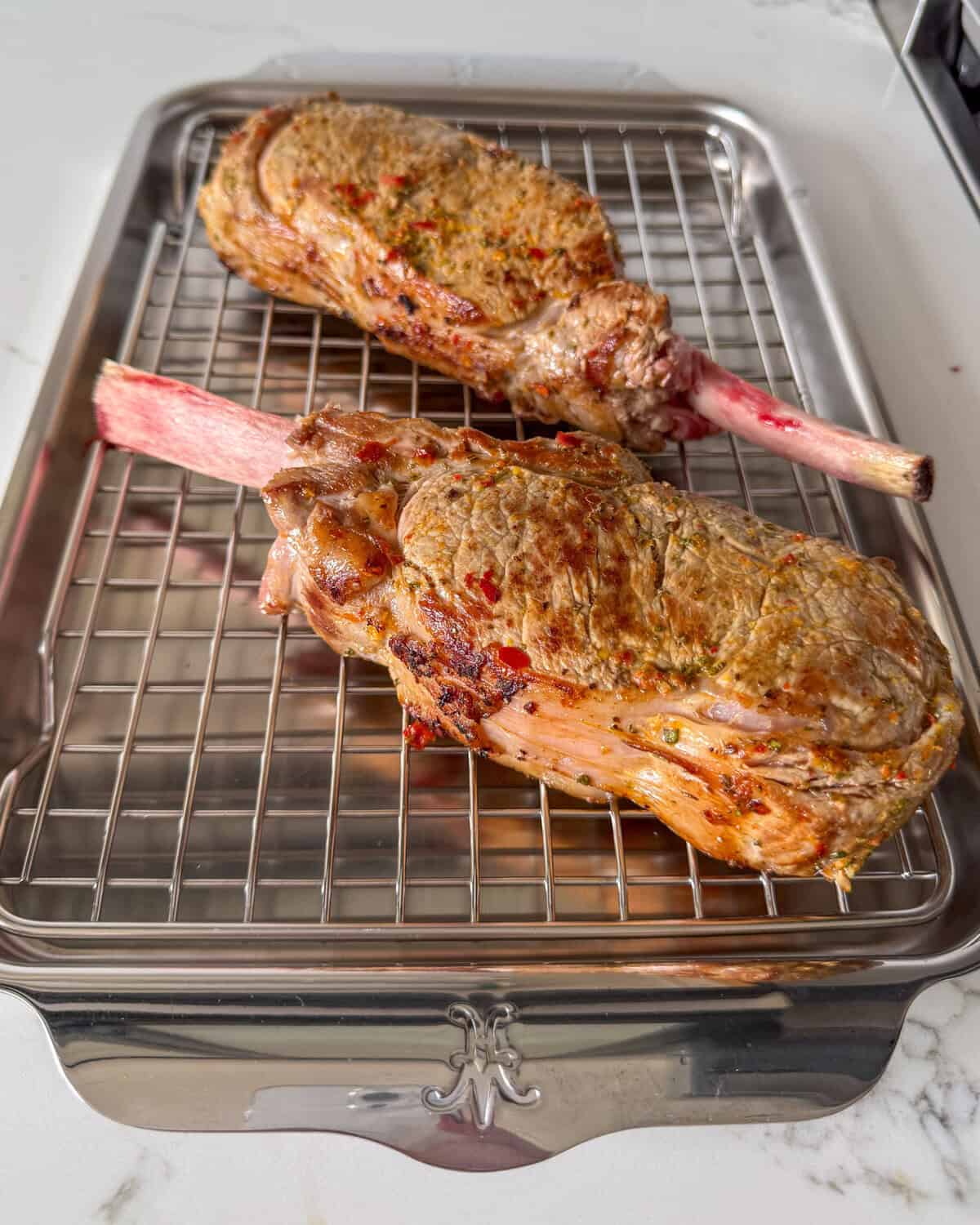 Sear veal chops 2-3 minutes per side, including the fat cap, until golden brown.