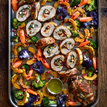 Stuffed rolled urkey thighs with spinach & feta, sliced and served with roasted vegetables.