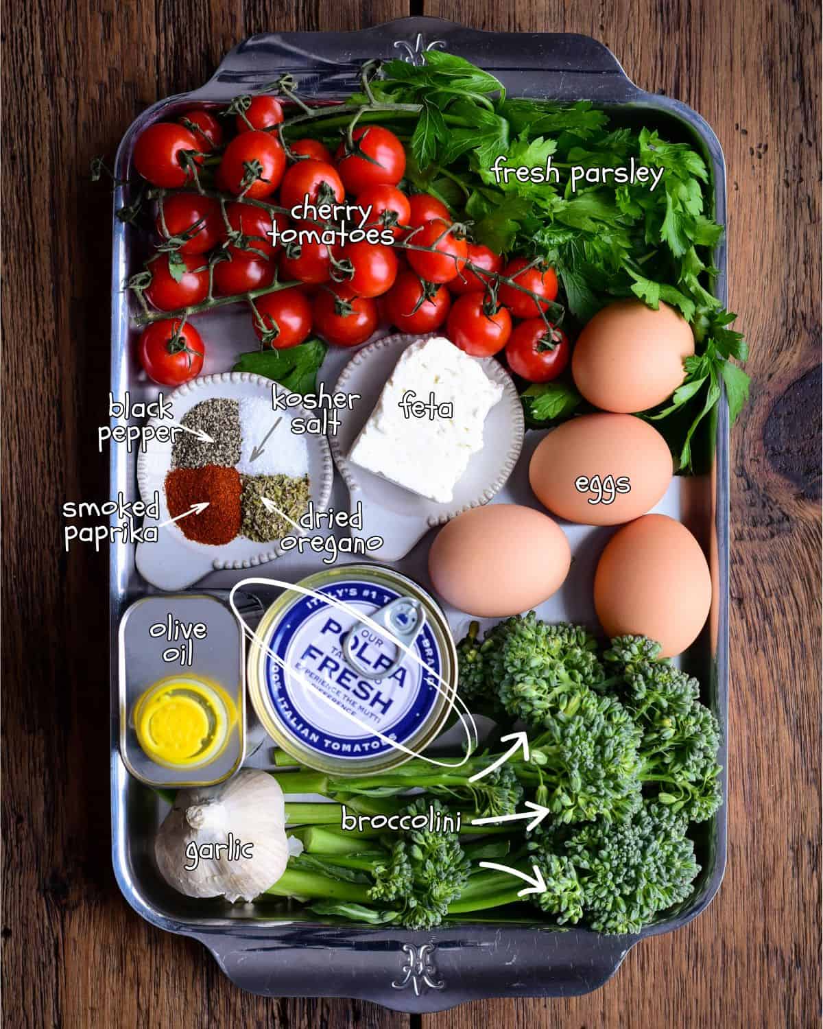 Ingredients for a cherry tomato and broccoli shakshuka.