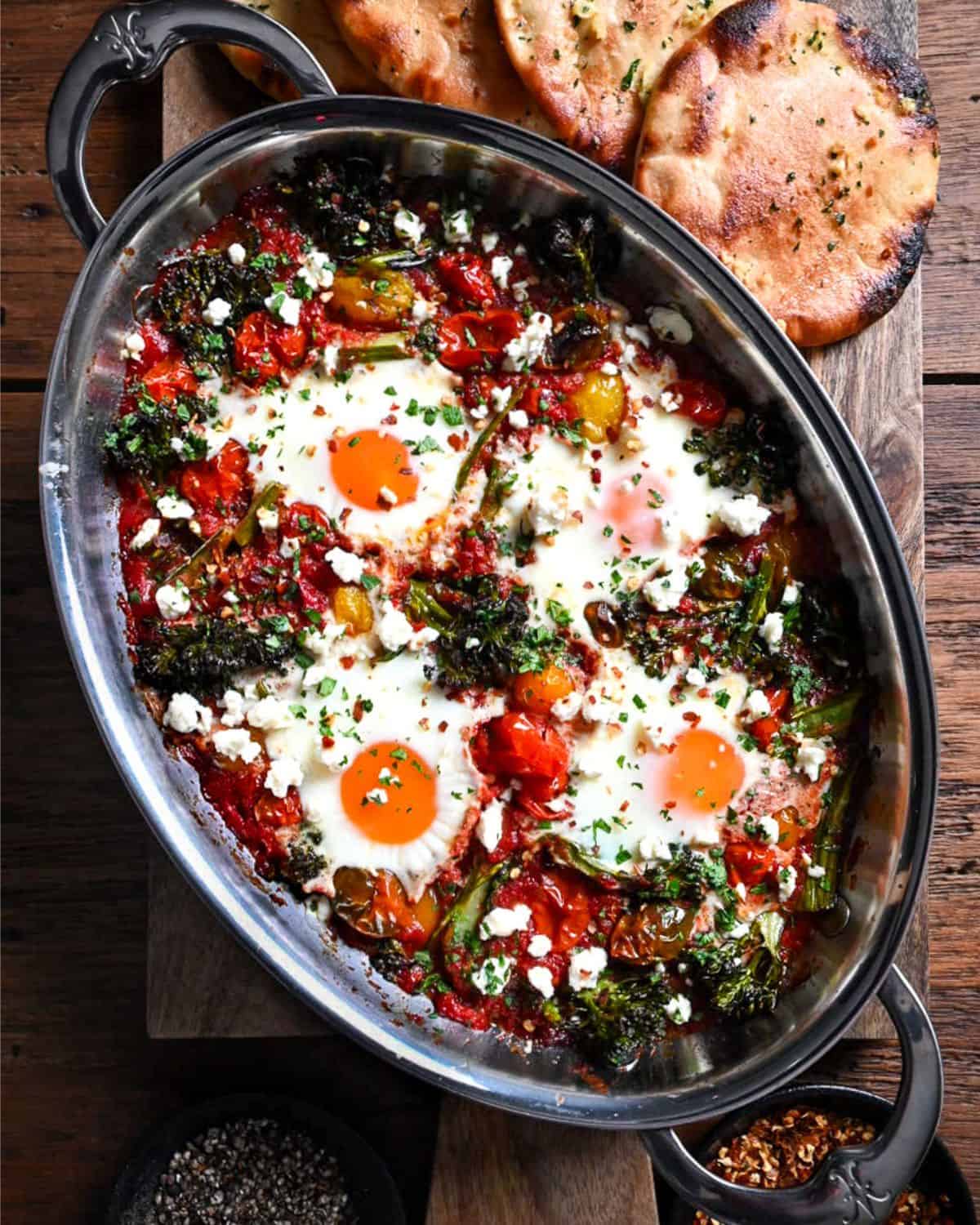 A Cherry Tomato & Broccolini Shakshuka with four eggs.