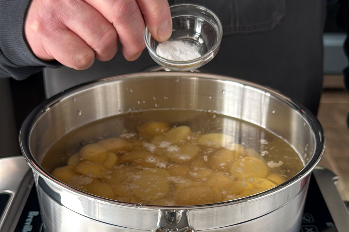 Boil your potatoes with baking soda to get a crispy exterior.