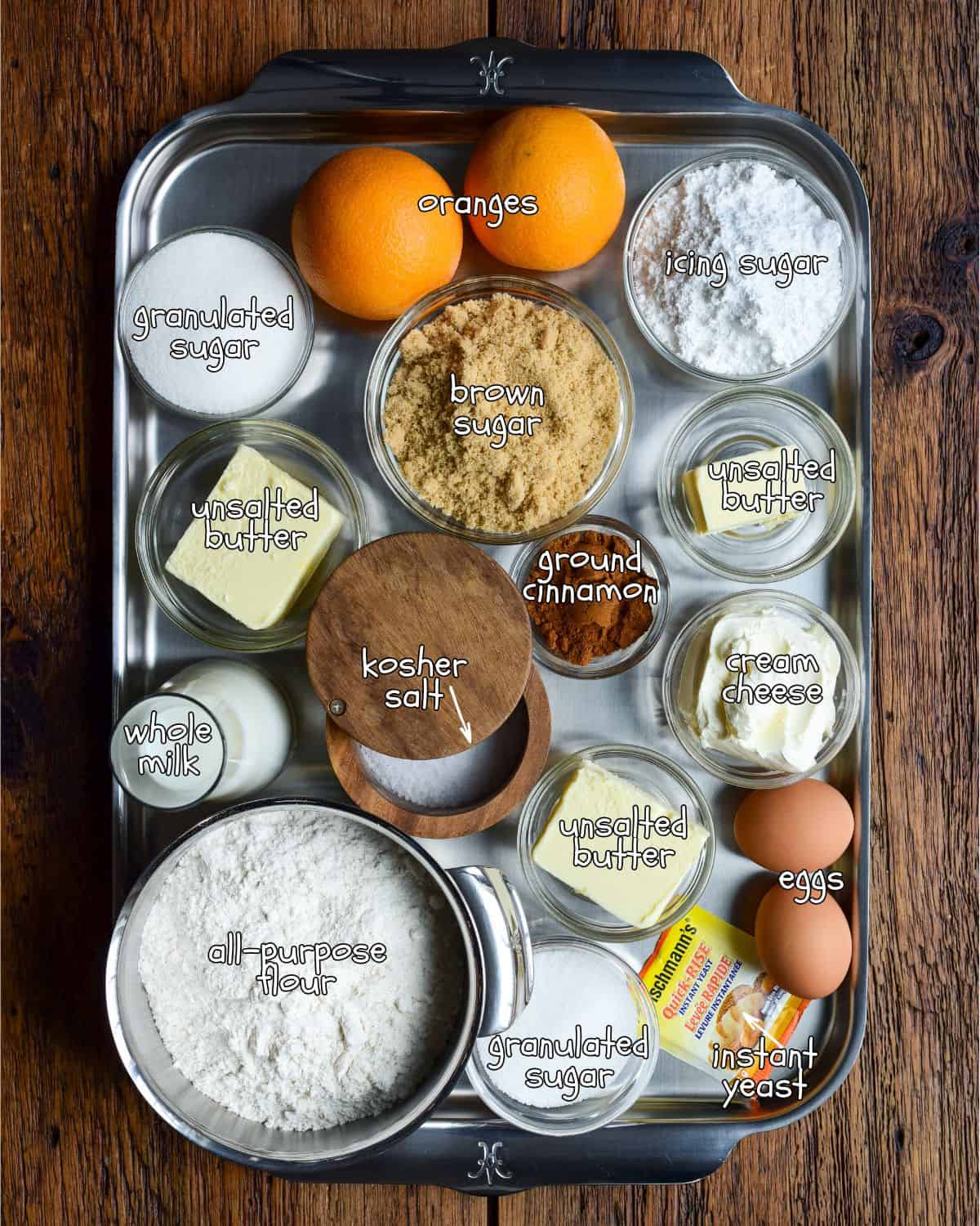 Ingredients for an orange cinnamon rolls recipe.
