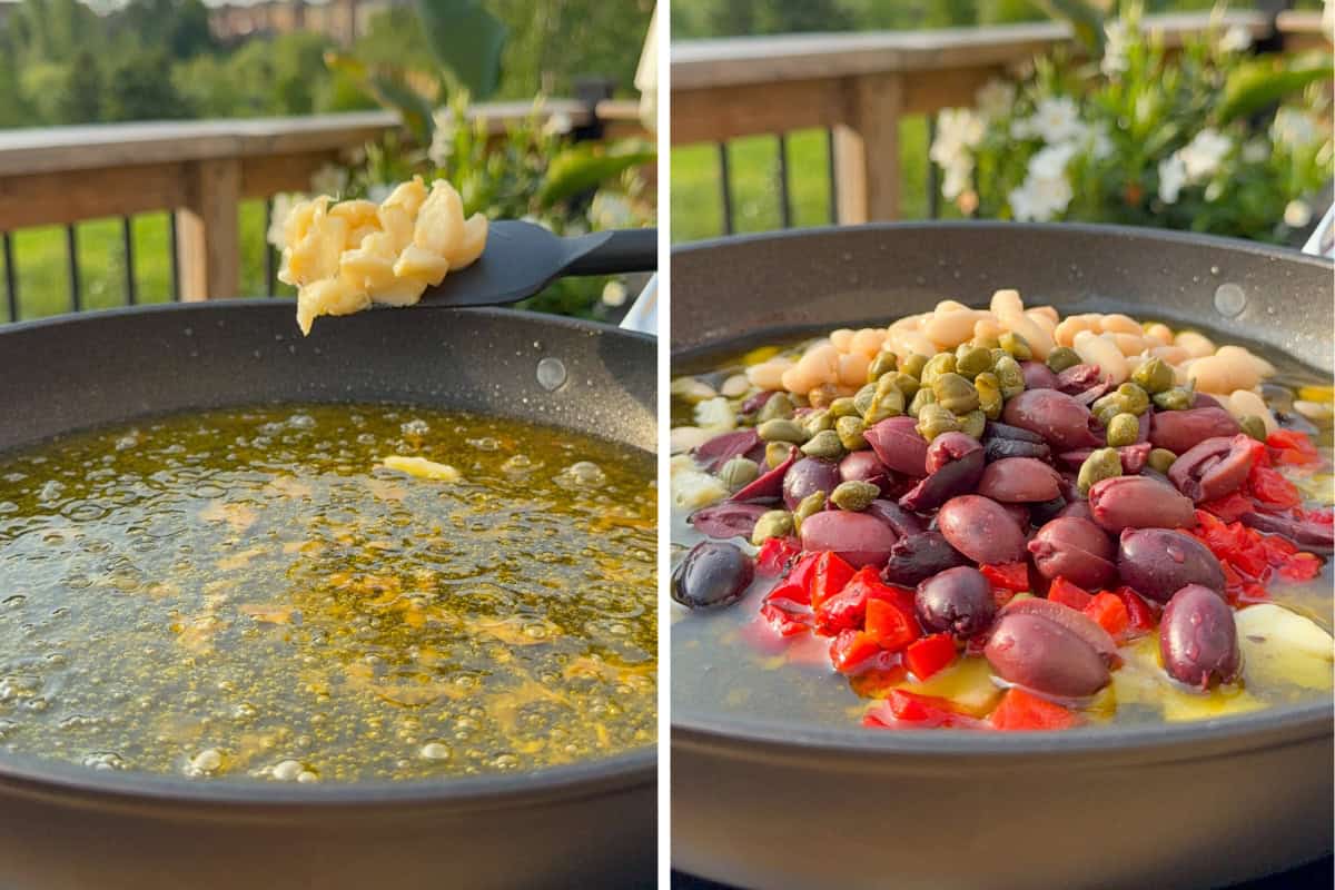 Add the roasted garlic to the anchovy olive oil. Next, add the olives, capers, roasted red peppers and beans.