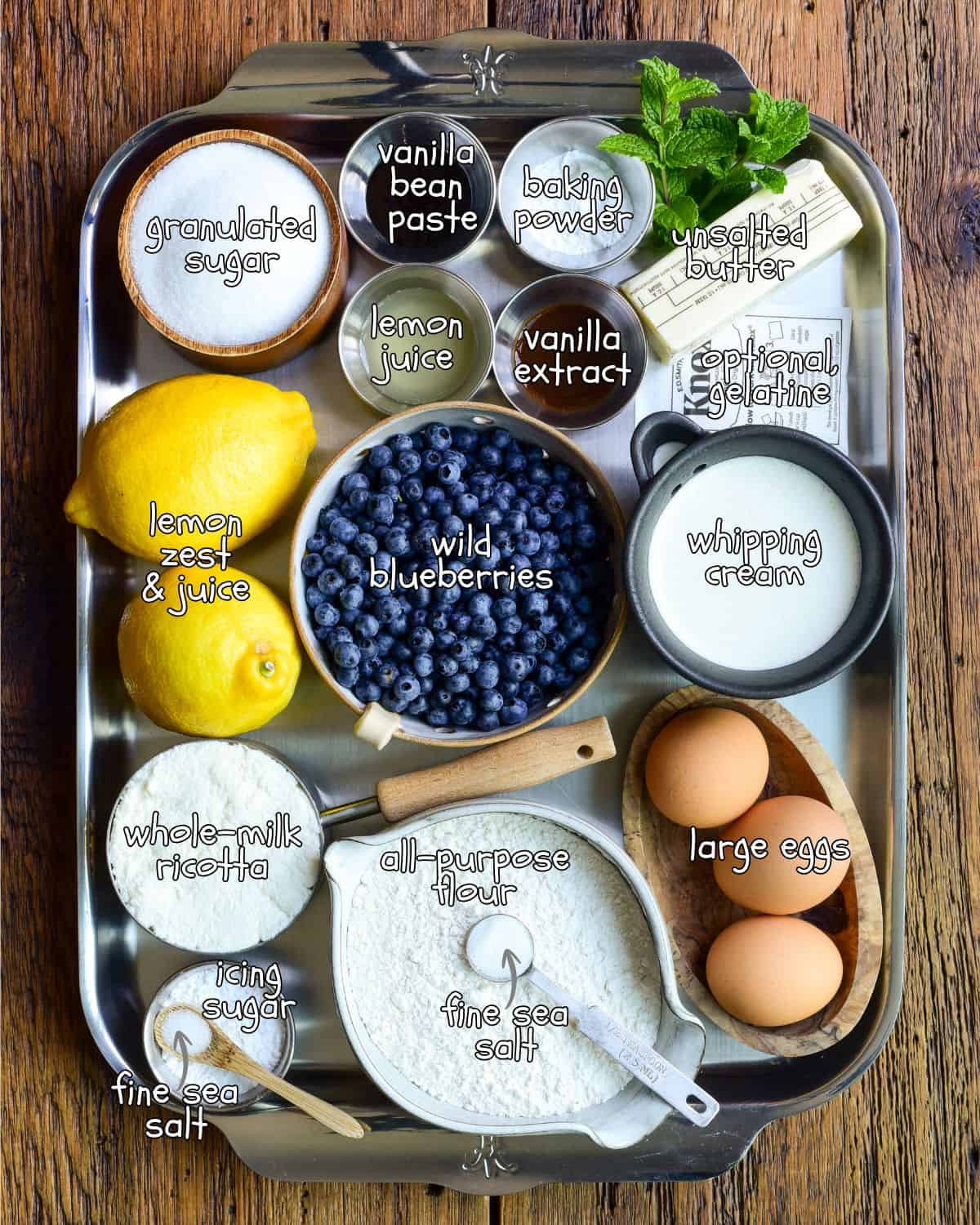 Ingredients measured and laid out for a blueberry snack cake recipe.