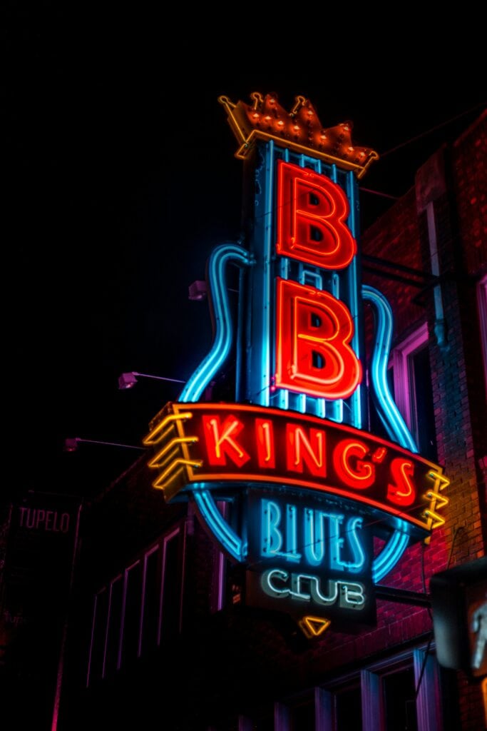The sign for BB King's Blues Club is lit up in neon and hosts many jam sessions.