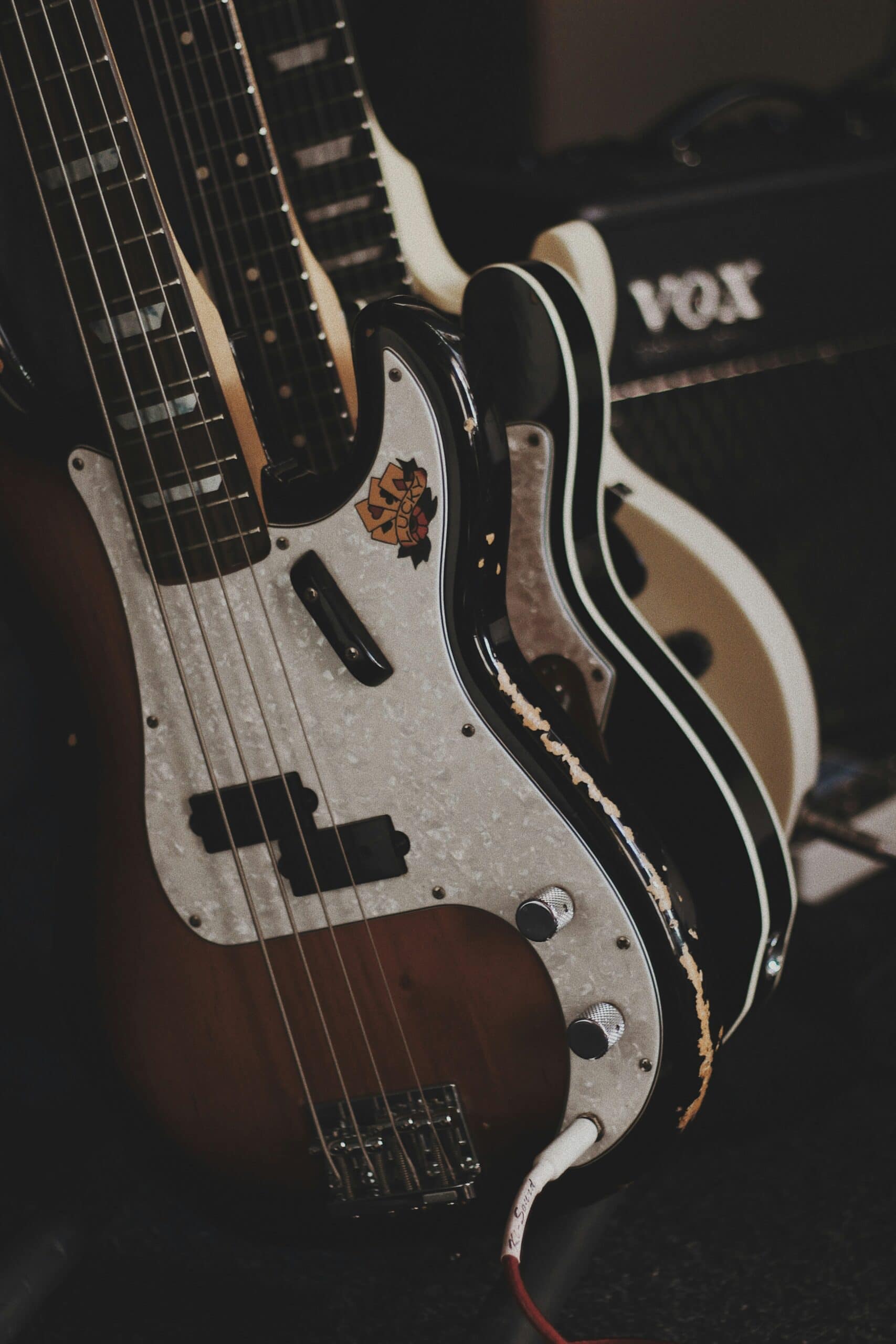 A row of bass guitars, the key part of your bass gear package.