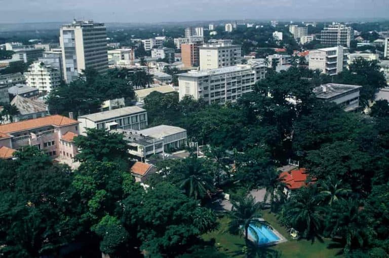 Aerial view of Kinshasa, Democratic Republic of the Congo skyline with modern buildings and lush gre.