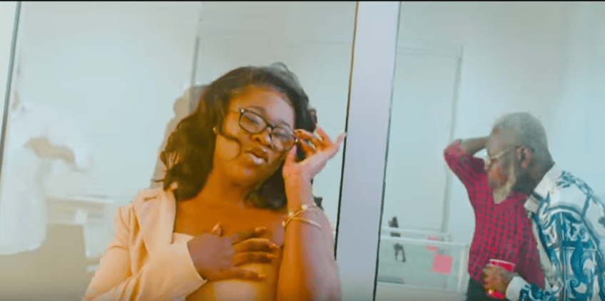 Sista Afia singing passionately in the "Weather" music video featuring Medikal & Quamina MP.