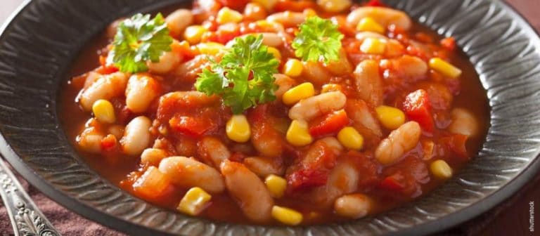 Traditional Kenyan Githeri with beans, corn, and vegetables in a savory sauce.