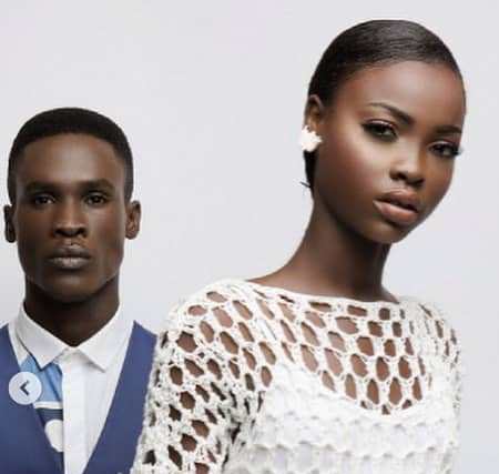 Ndebele woman showcasing traditional heritage through contemporary fashion and style.