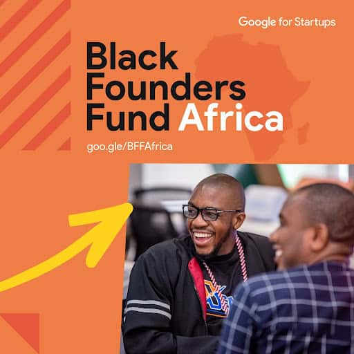 African entrepreneurs smiling at startup event, applying for Google Black Founders Fund.