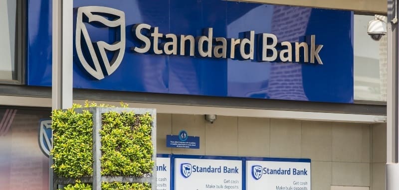 Standard Bank branch exterior with branding and signage.