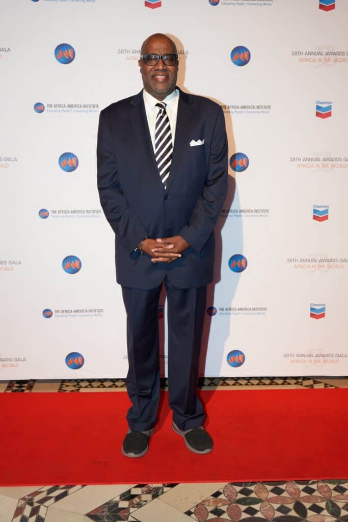 African man in formal suit at Africa in the World event.