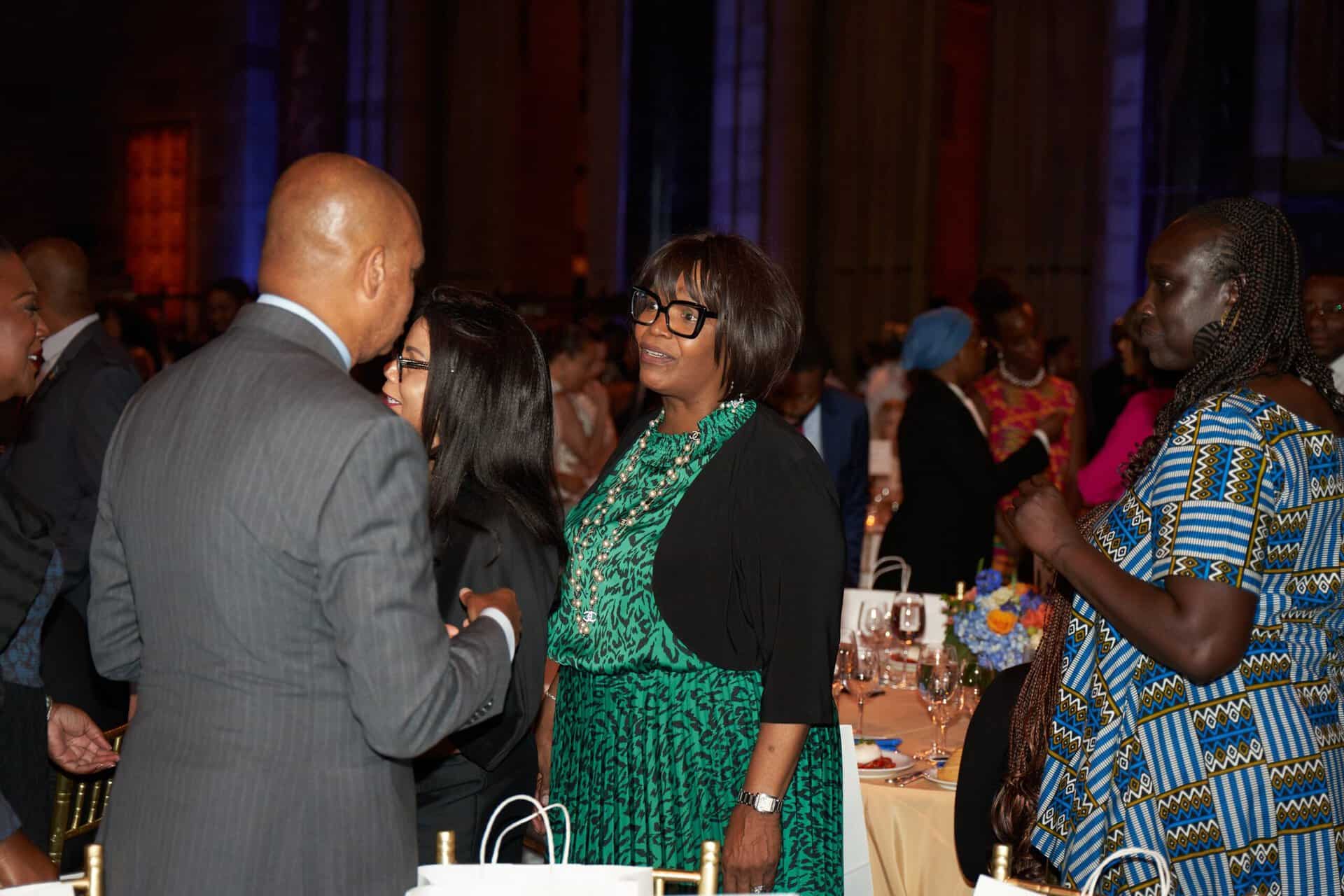 Diverse professionals engaging at Africa in the World event.