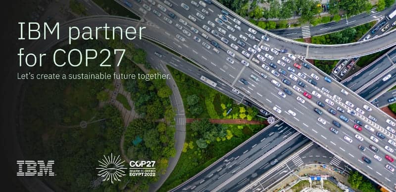 Aerial view of busy highway interchange symbolizing sustainable transportation.