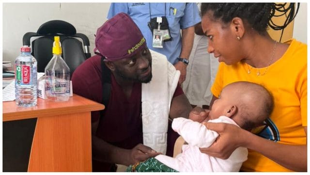 Dr. Michael K. Obeng providing reconstructive surgery to a young patient in Ho.