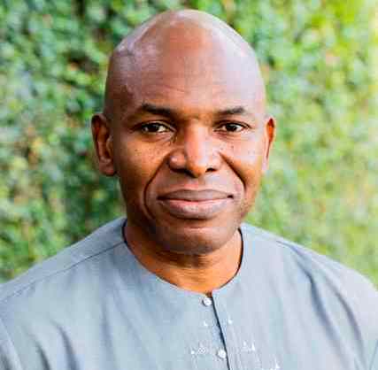 Portrait of an African man outdoors, symbolizing leadership and progress in Africa.