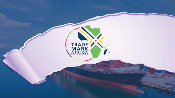 TradeMark Africa logo over West African port with shipping containers.