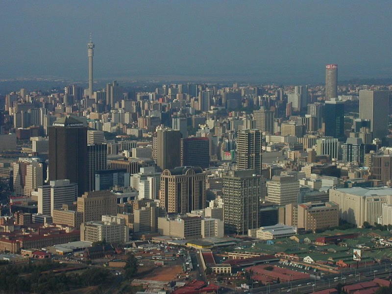 Urban skyline of Johannesburg, South Africa featuring prominent skyscrapers and cityscape.