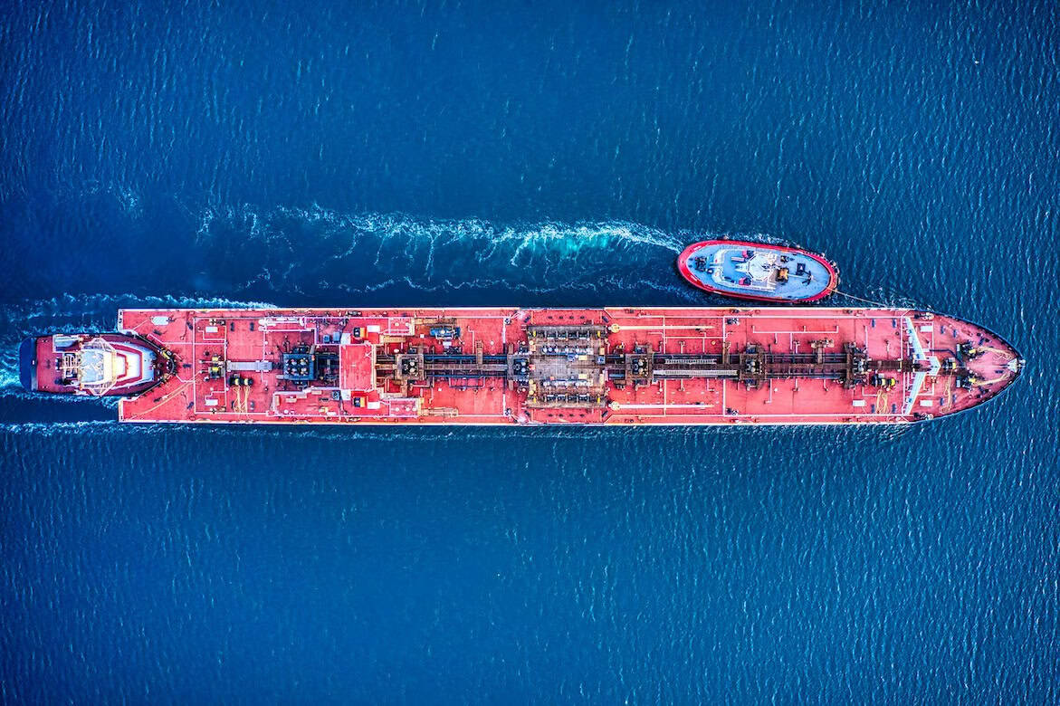 Oil tanker ship navigating open waters for transportation.