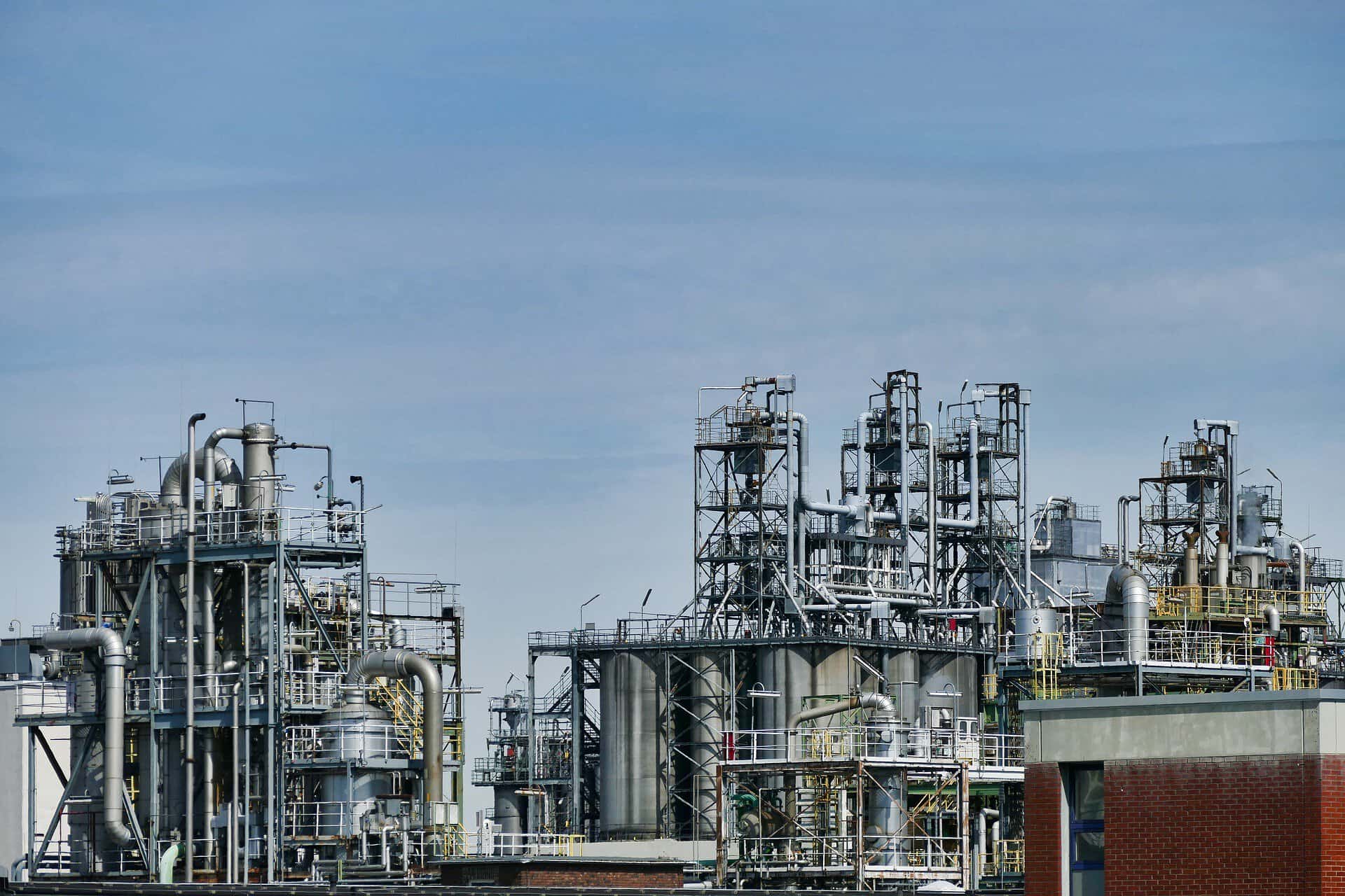 Oil refinery infrastructure with complex pipes and processing units in Africa.