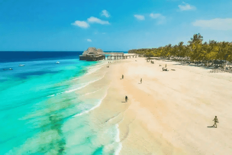 Beautiful African beach with turquoise waters and white sand in summer 2023.