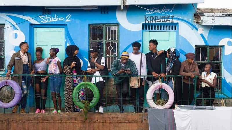 Young entrepreneurs waiting in line at a Kenyan startup hub.