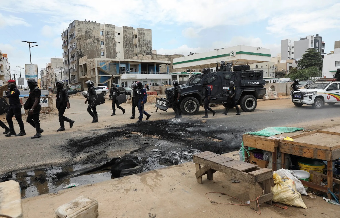 Police and armored vehicles in Senegal amid political unrest.