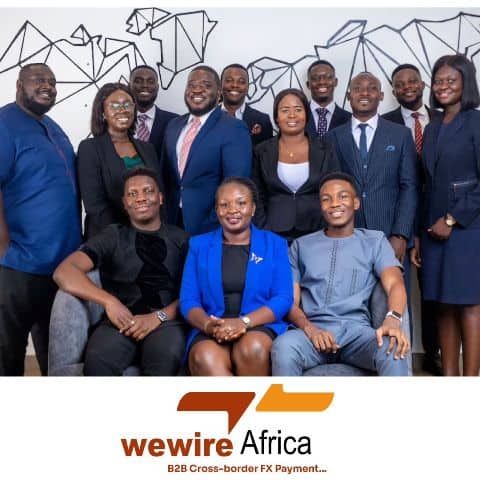 Group of African entrepreneurs in business attire at a networking event.
