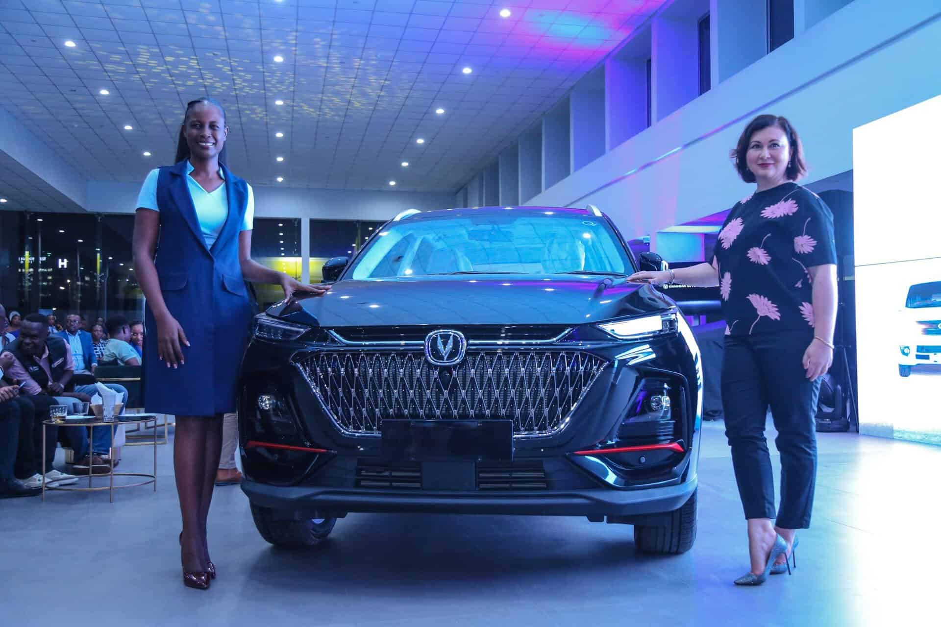 Two women showcase the new Changan vehicle at the Inchcape launch event in Kenya.