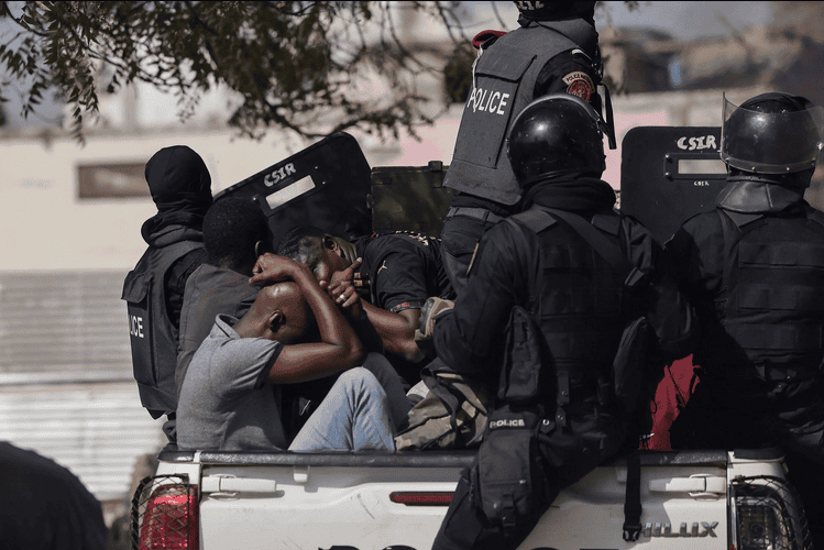 Police confront protesters during Senegal election unrest, highlighting violence and repression.
