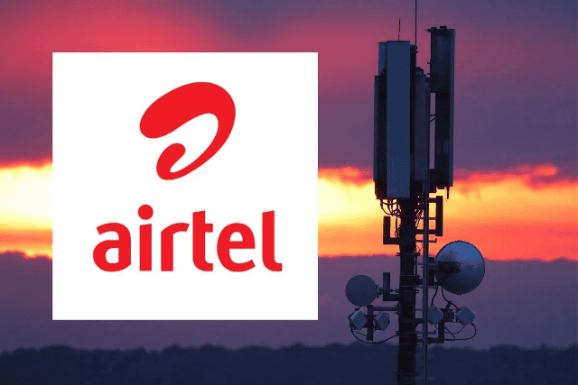 Airtel Africa network tower with antennas at sunset in Africa.
