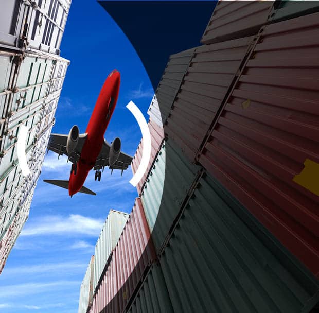 Airplane flying between shipping containers in an African capital market environment.