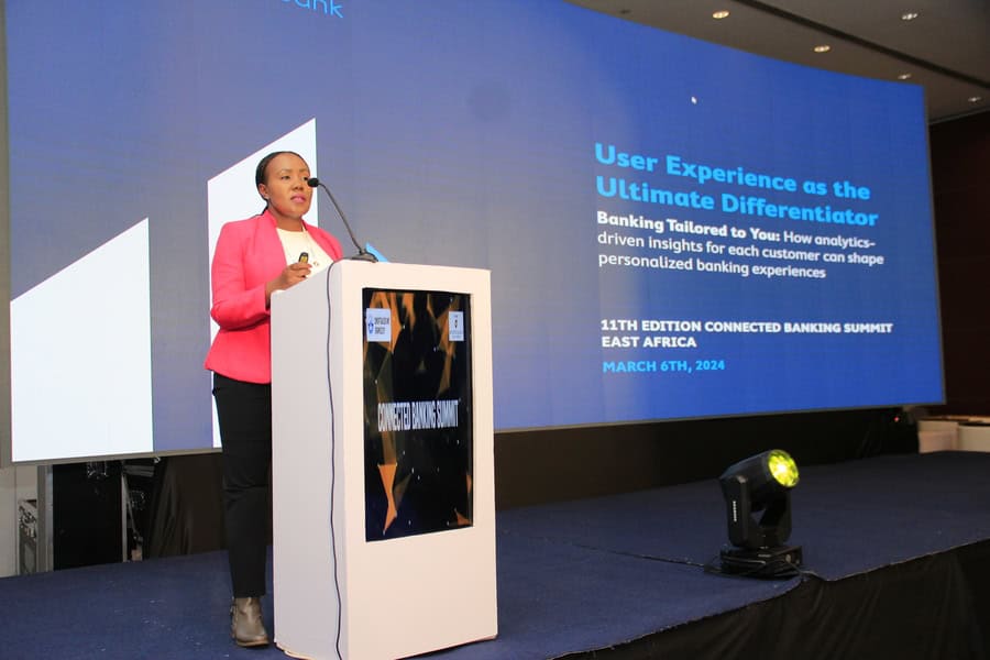 Woman speaking at Connected Banking Summit East Africa 2024 on banking innovation and customer exper.