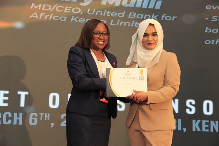 Women in banking celebrating at the Connected Banking Summit.