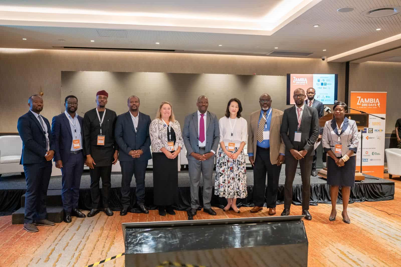 Zambian officials and partners at energy access event in Lusaka.