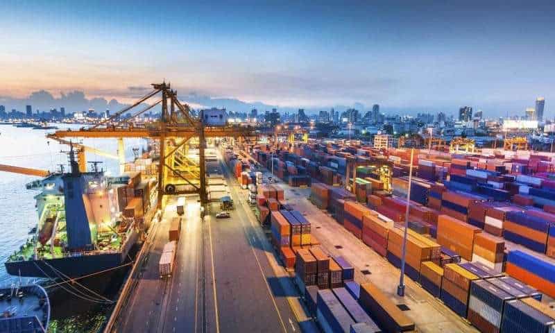 Seaport with cargo containers, cranes, and ships highlighting Africa’s growing trade potential.
