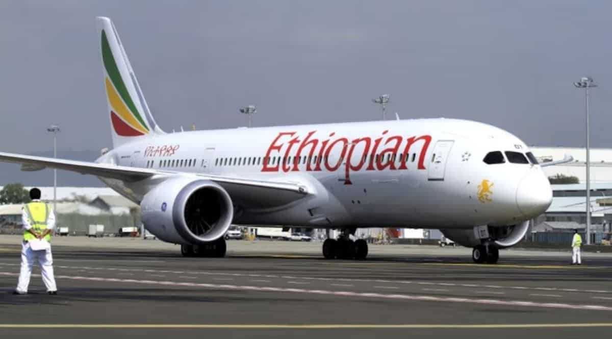 Ethiopian Airlines Boeing 737 aircraft on runway at Kigali Airport, Rwanda.