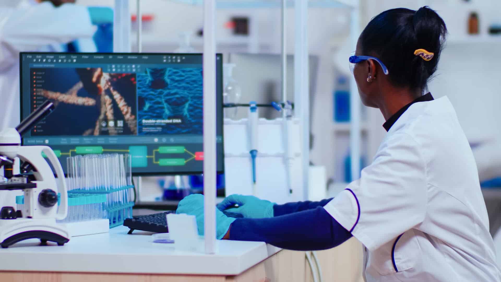 Scientist working on health technology in African laboratory setting.