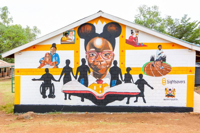 Colorful mural depicting children with disabilities advocating for rights.
