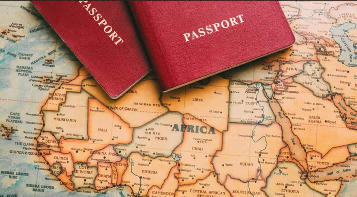 Red passports on African map highlighting visa openness in Africa.