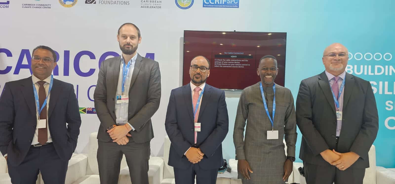 Group of professionals at Africa climate resilience event during COP29.