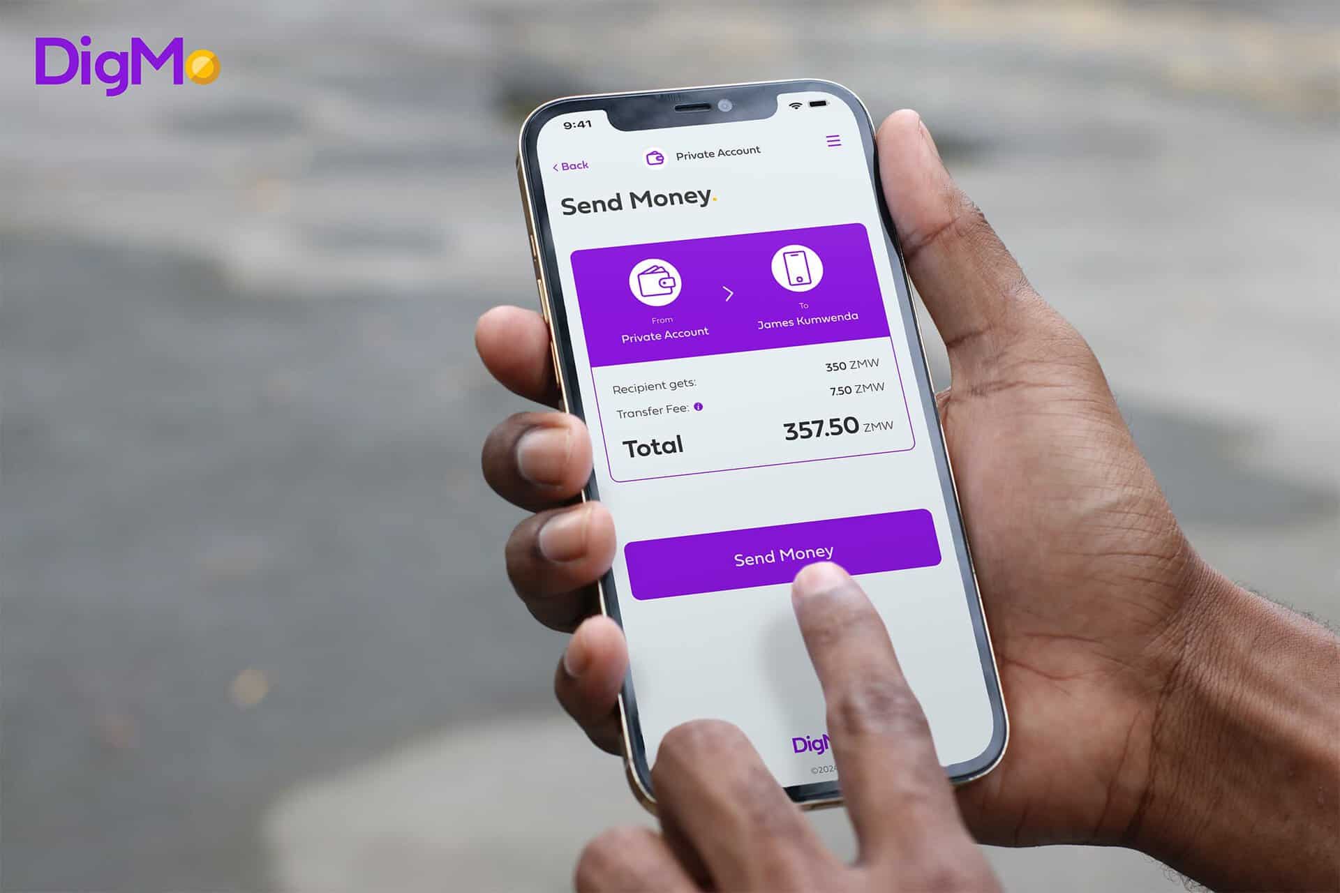 Mobile phone displaying DigMo financial app for money transfer.